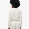 Blouse smockée à manches longues et bordures en dentelle Blouse smockée à manches longues et bordures en dentelle