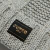 Bonnet en maille torsadée Bonnet en maille torsadée