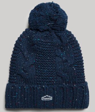 Bonnet à pompon en maille torsadée