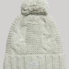 Bonnet à pompon en maille torsadée Bonnet à pompon en maille torsadée