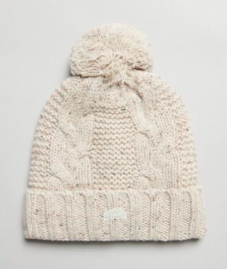 Bonnet à pompon en maille torsadée
