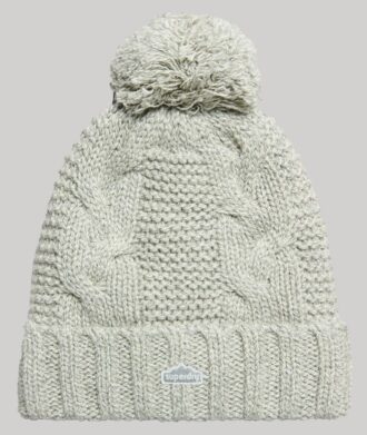 Bonnet à pompon en maille torsadée