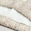 Bonnet à pompon en maille torsadée Bonnet à pompon en maille torsadée