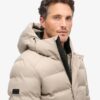 Doudoune Puffer en tweed à capuche
