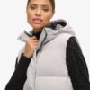 Gilet matelassé long Hooded Gilet matelassé long Hooded