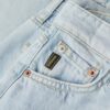 Jeans évasé à jambes larges et ourlet brut Jeans évasé à jambes larges et ourlet brut