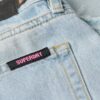 Jeans évasé à jambes larges et ourlet brut Jeans évasé à jambes larges et ourlet brut