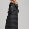 Manteau matelassé long à capuche en fausse fourrure Manteau matelassé long à capuche en fausse fourrure