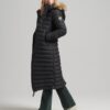 Manteau matelassé long à capuche en fausse fourrure Manteau matelassé long à capuche en fausse fourrure