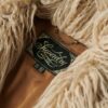 Manteau mi-long en fausse fourrure Manteau mi-long en fausse fourrure