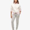 Pantalon de jogging slim avec logo métallisé de luxe Pantalon de jogging slim avec logo métallisé de luxe