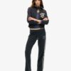 Pantalon de jogging évasé à rayures Athletic Essentials Pantalon de jogging évasé à rayures Athletic Essentials