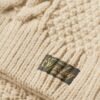 Polo en maille torsadée Aran
