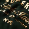 Robe en jersey avec logo métallisé de luxe Robe en jersey avec logo métallisé de luxe