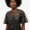 Robe midi volumineuse à volants en maille Robe midi volumineuse à volants en maille