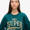 Robe sweat avec logo métallisé de luxe Robe sweat avec logo métallisé de luxe