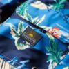 Shorts de bain 43 cm à imprimé hawaïen recyclé Shorts de bain 43 cm à imprimé hawaïen recyclé