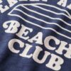T-shirt à col lanières et imprimé plage Athletic Essentials T-shirt à col lanières et imprimé plage Athletic Essentials